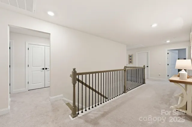 a view of a hallway with windows