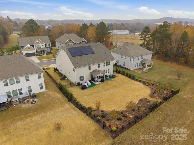 aerial view of a house with outdoor space