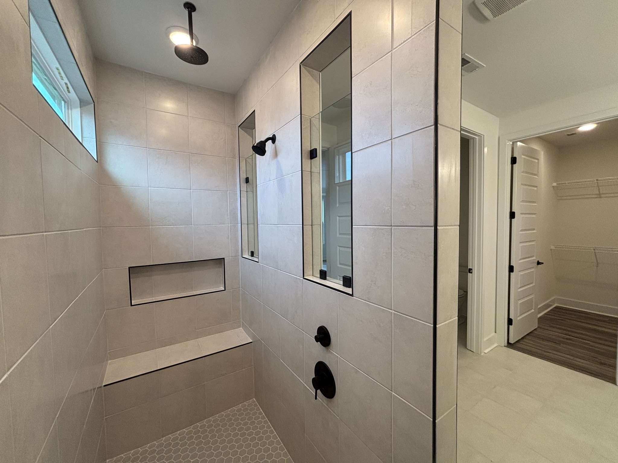 21 Pinnacles Lane Lebanon, TN 37090 - Photo 20 of 81 a bathroom with a shower and a mirror