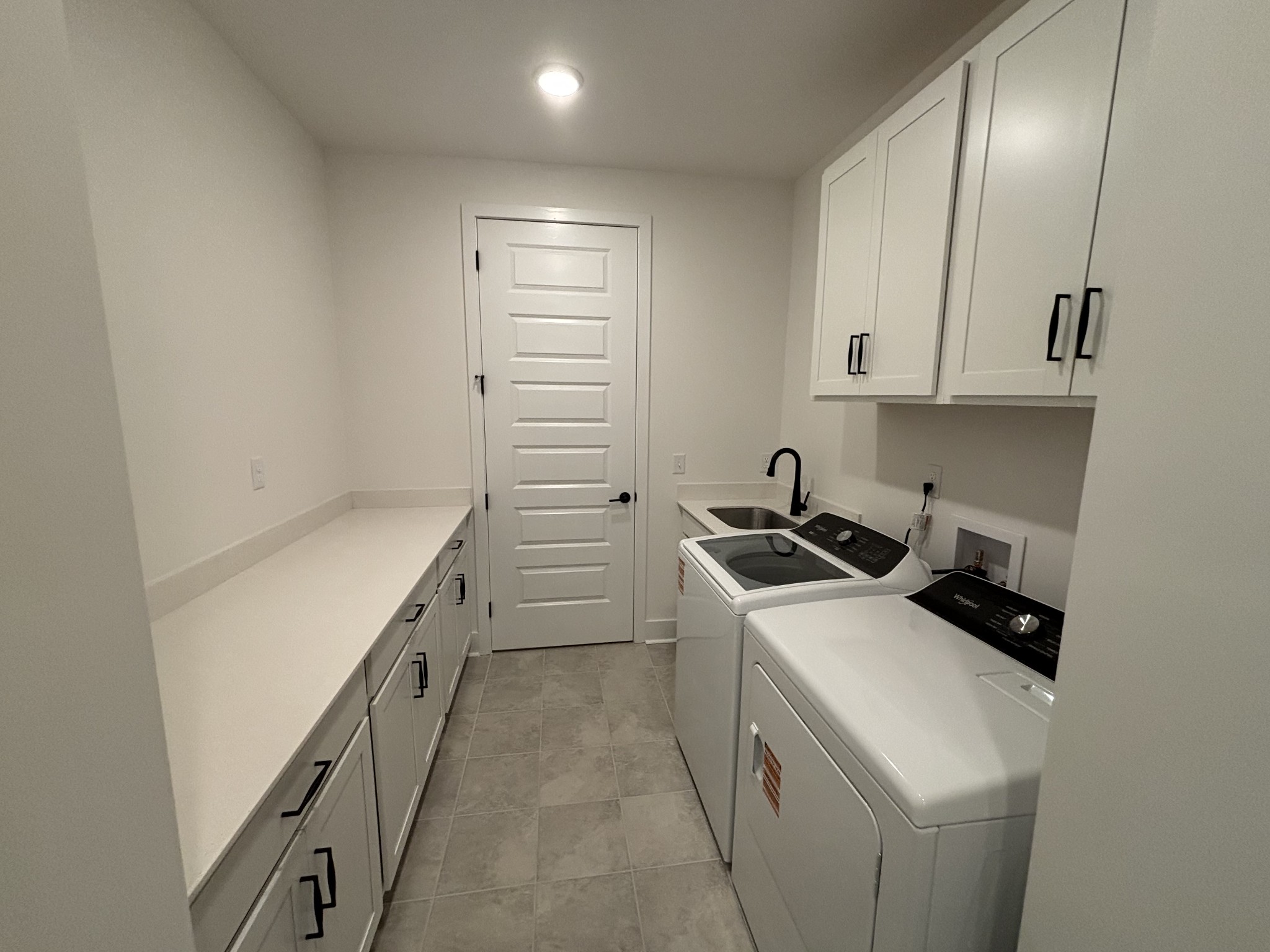 21 Pinnacles Lane Lebanon, TN 37090 - Photo 25 of 81 a utility room with cabinets washer and dryer
