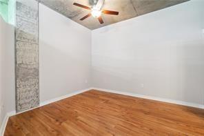 3300 Windy Ridge Parkway Southeast, Unit 913 Atlanta, GA 30339 - Photo 19 of 28 a view of a big room with wooden floor