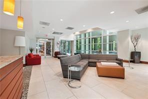 3300 Windy Ridge Parkway Southeast, Unit 913 Atlanta, GA 30339 - Photo 21 of 28 a living room with furniture and a large window