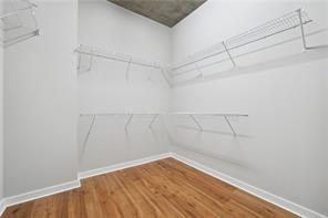 3300 Windy Ridge Parkway Southeast, Unit 913 Atlanta, GA 30339 - Photo 25 of 28 a view of a room with racks on the wall