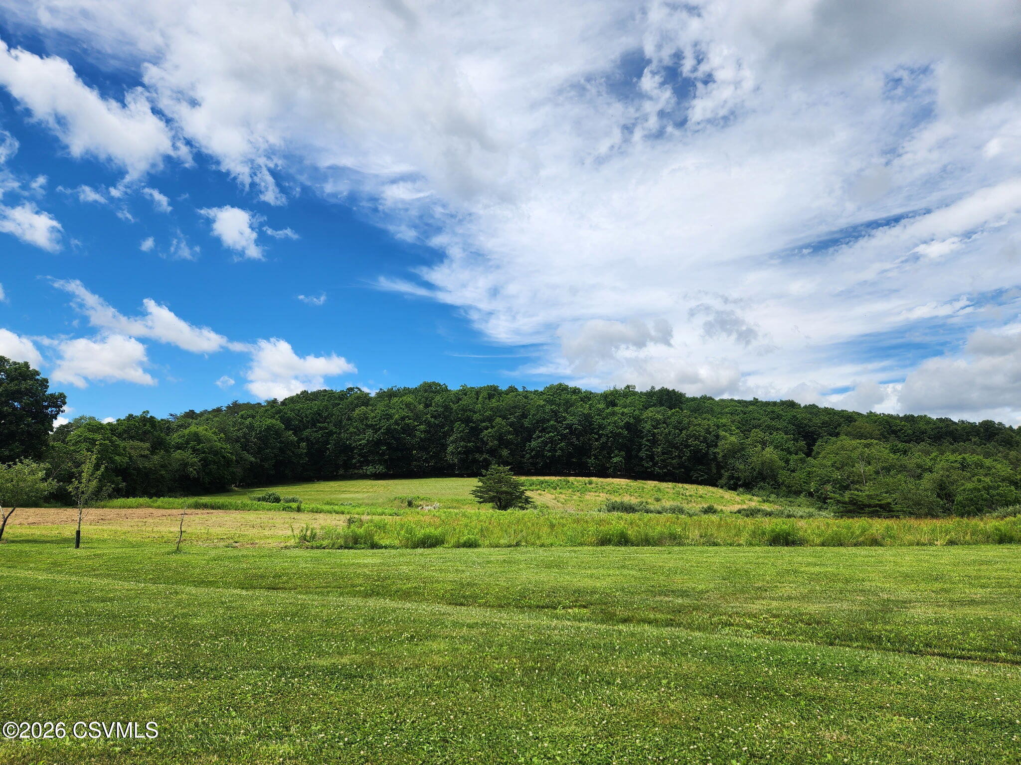 Valley West Road Danville, PA 17821 - Photo 1 of 14 a view of a green field with wooden fence