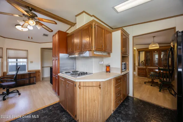 a kitchen with stainless steel appliances granite countertop a stove and a sink