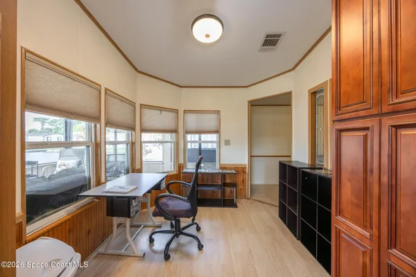 a kitchen with counter top space and stainless steel appliances