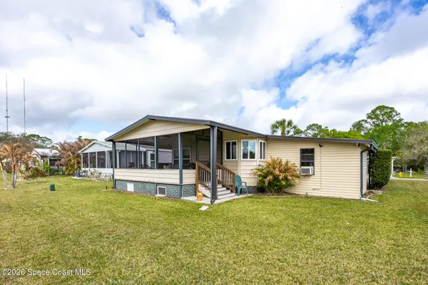 a view of living room and dining room