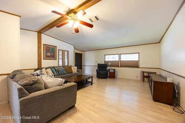 a kitchen with sink cabinets and window