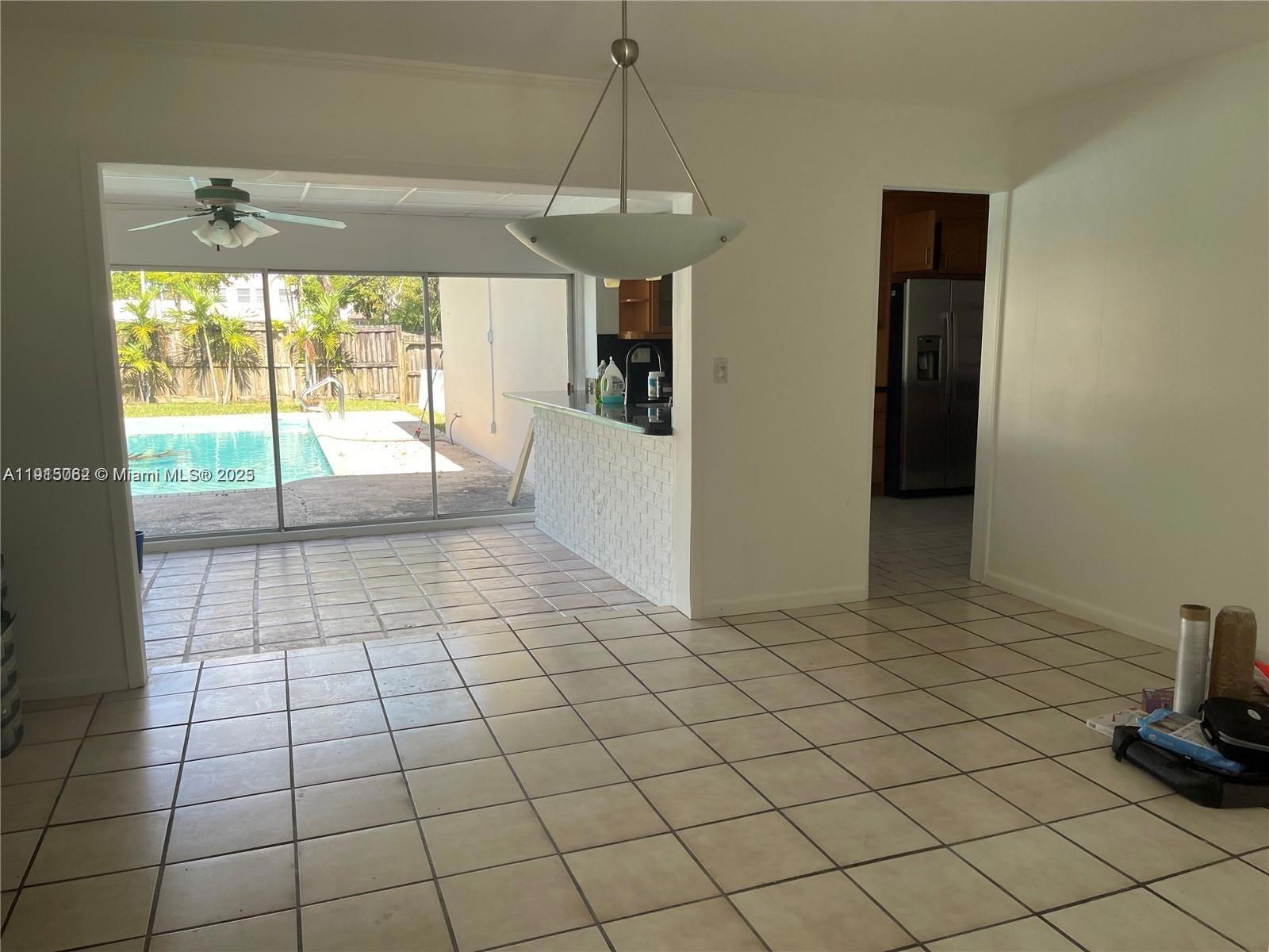 4315 Harrison Street Hollywood, FL 33021 - Photo 3 of 16 a view of a room and window