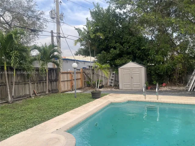 a house view with a garden space