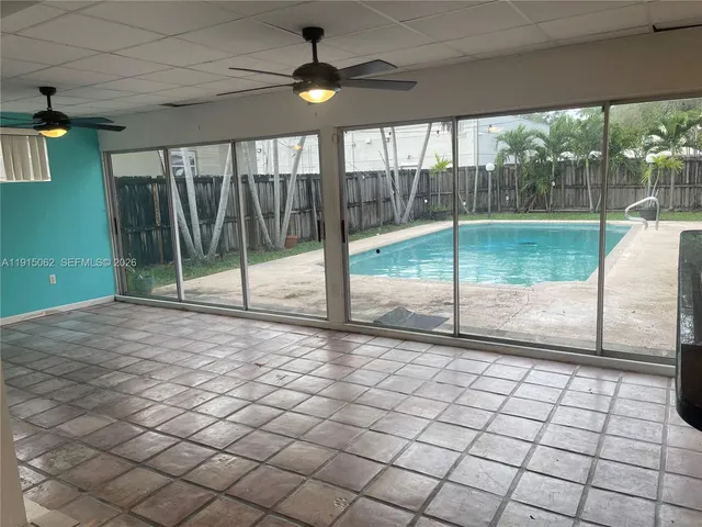 a view of an empty room and window