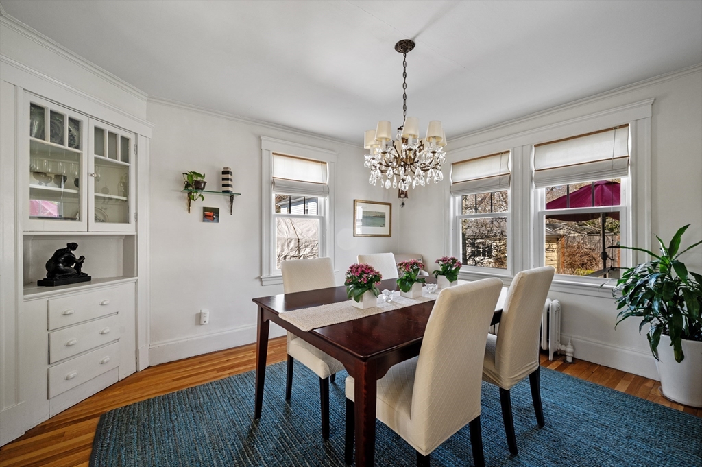 23 Tedesco Street Marblehead, MA 01945 - Photo 11 of 43 a view of a dining room with furniture and wooden floor