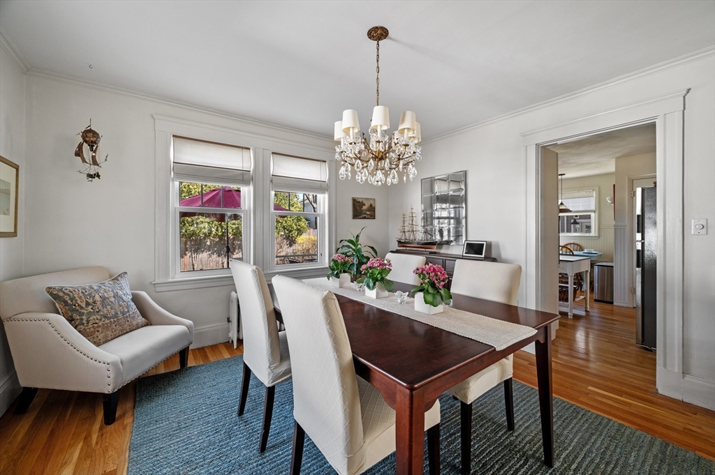 23 Tedesco Street Marblehead, MA 01945 - Photo 12 of 43 a living room with furniture and a chandelier