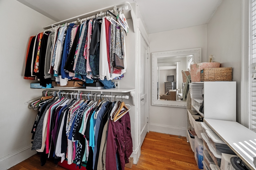 23 Tedesco Street Marblehead, MA 01945 - Photo 27 of 43 a view of walk in closet with clothes and shoes