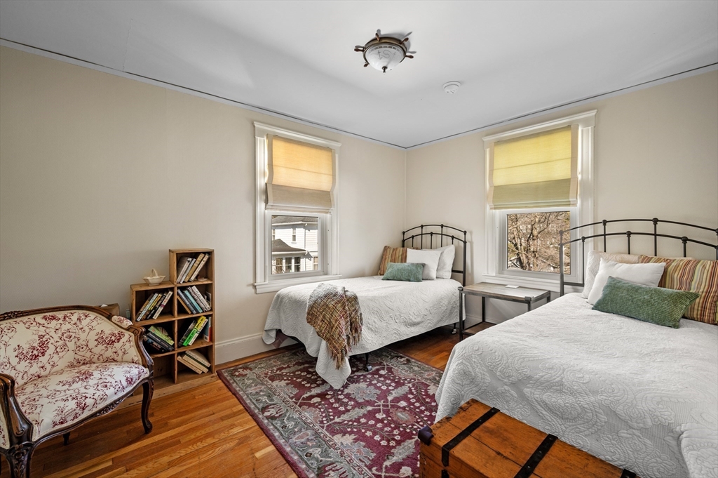 23 Tedesco Street Marblehead, MA 01945 - Photo 28 of 43 a bedroom with two beds and windows