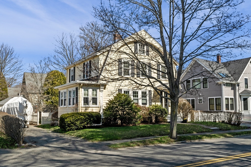 23 Tedesco Street Marblehead, MA 01945 - Photo 3 of 43 a front view of a house with garden