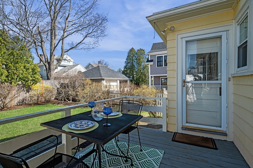 23 Tedesco Street Marblehead, MA 01945 - Photo 32 of 43 a view of a house with backyard and sitting area