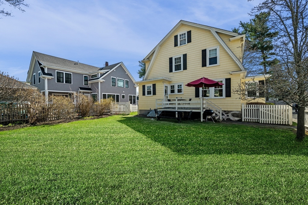 23 Tedesco Street Marblehead, MA 01945 - Photo 33 of 43 a front view of house with yard and green space