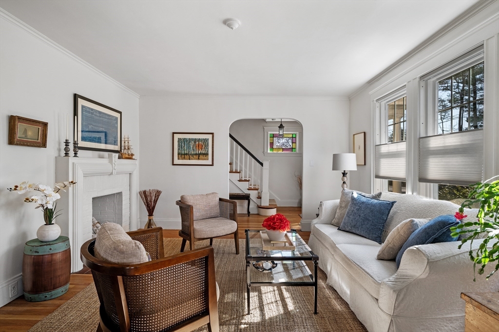23 Tedesco Street Marblehead, MA 01945 - Photo 6 of 43 a living room with furniture and a potted plant