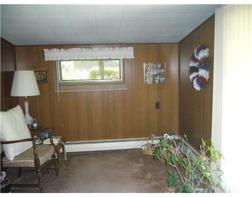 300 Valley Drive Rochester, PA 15074 - Photo 5 of 10 Den. Sweet den for an extra family room, computer room or play room. access to outside patio/carport.