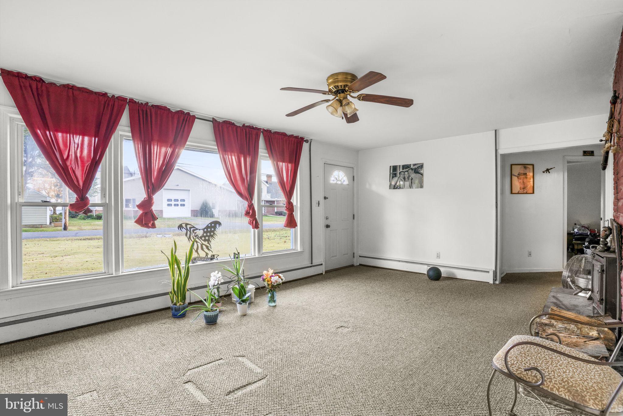 6040 Melbourne Avenue Deale, MD 20751 - Photo 11 of 37 a view of a livingroom with furniture and a window