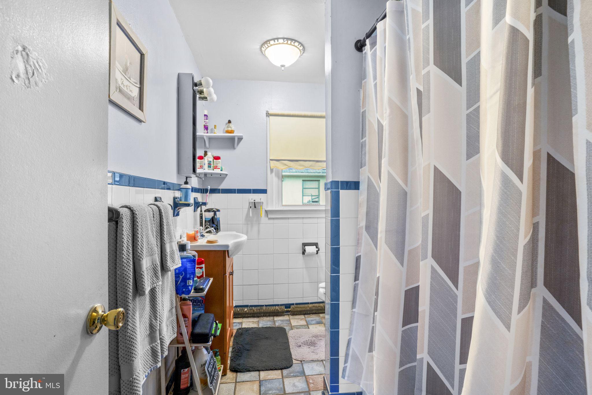 6040 Melbourne Avenue Deale, MD 20751 - Photo 12 of 37 a view of walk in closet with clothes and shoes