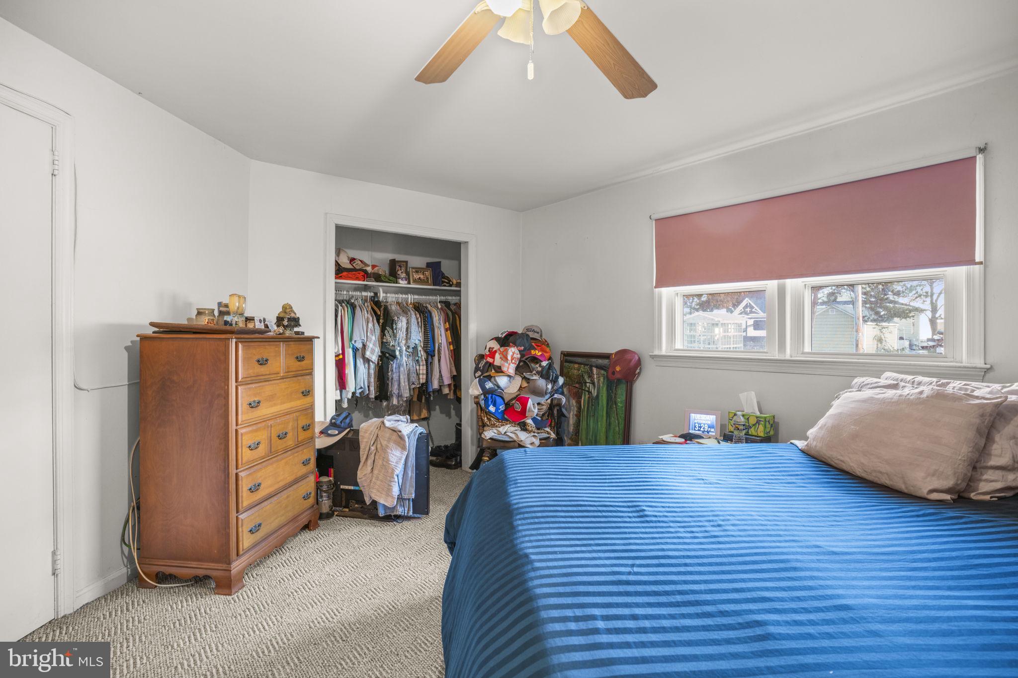 6040 Melbourne Avenue Deale, MD 20751 - Photo 14 of 37 a bed room with a bed and a window