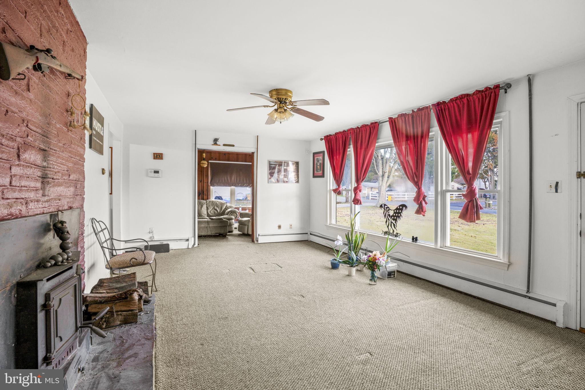 6040 Melbourne Avenue Deale, MD 20751 - Photo 10 of 37 a view of a livingroom with furniture and a window