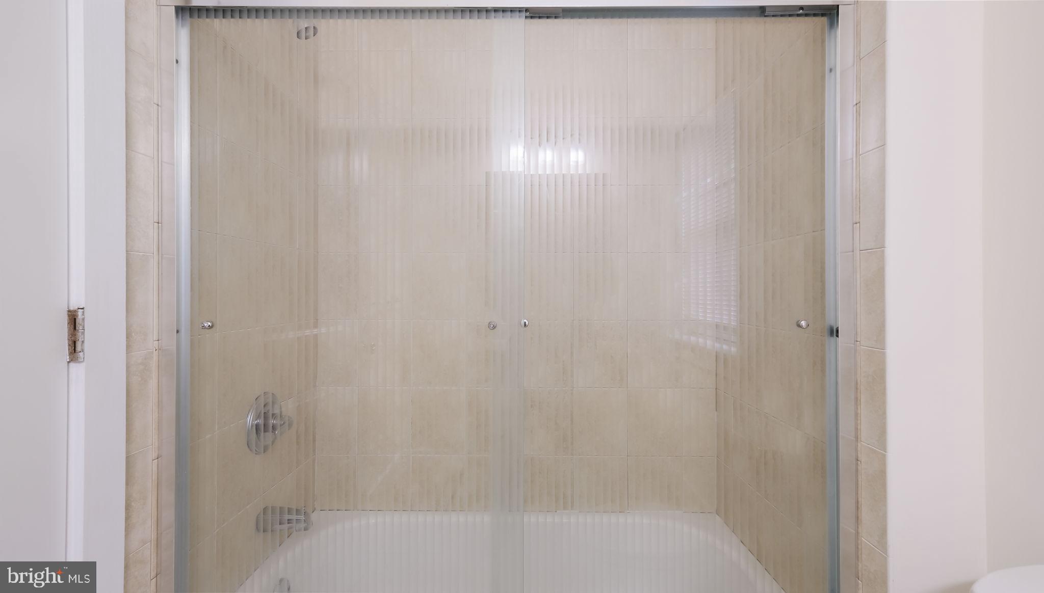 436 Sloan Street Philadelphia, PA 19104 - Photo 13 of 21 a close up of a bathtub in a bathroom