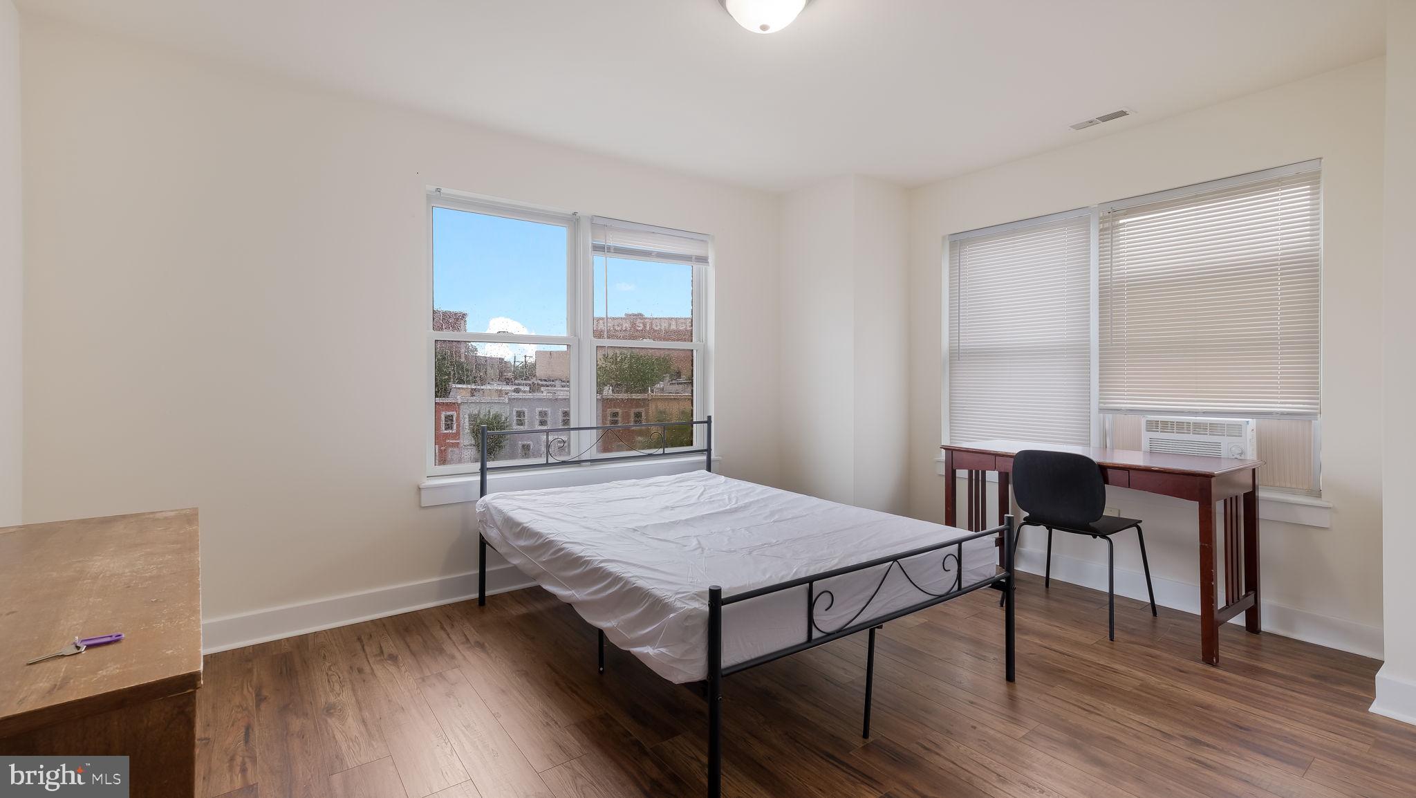 436 Sloan Street Philadelphia, PA 19104 - Photo 18 of 21 a view of a room with furniture and wooden floor