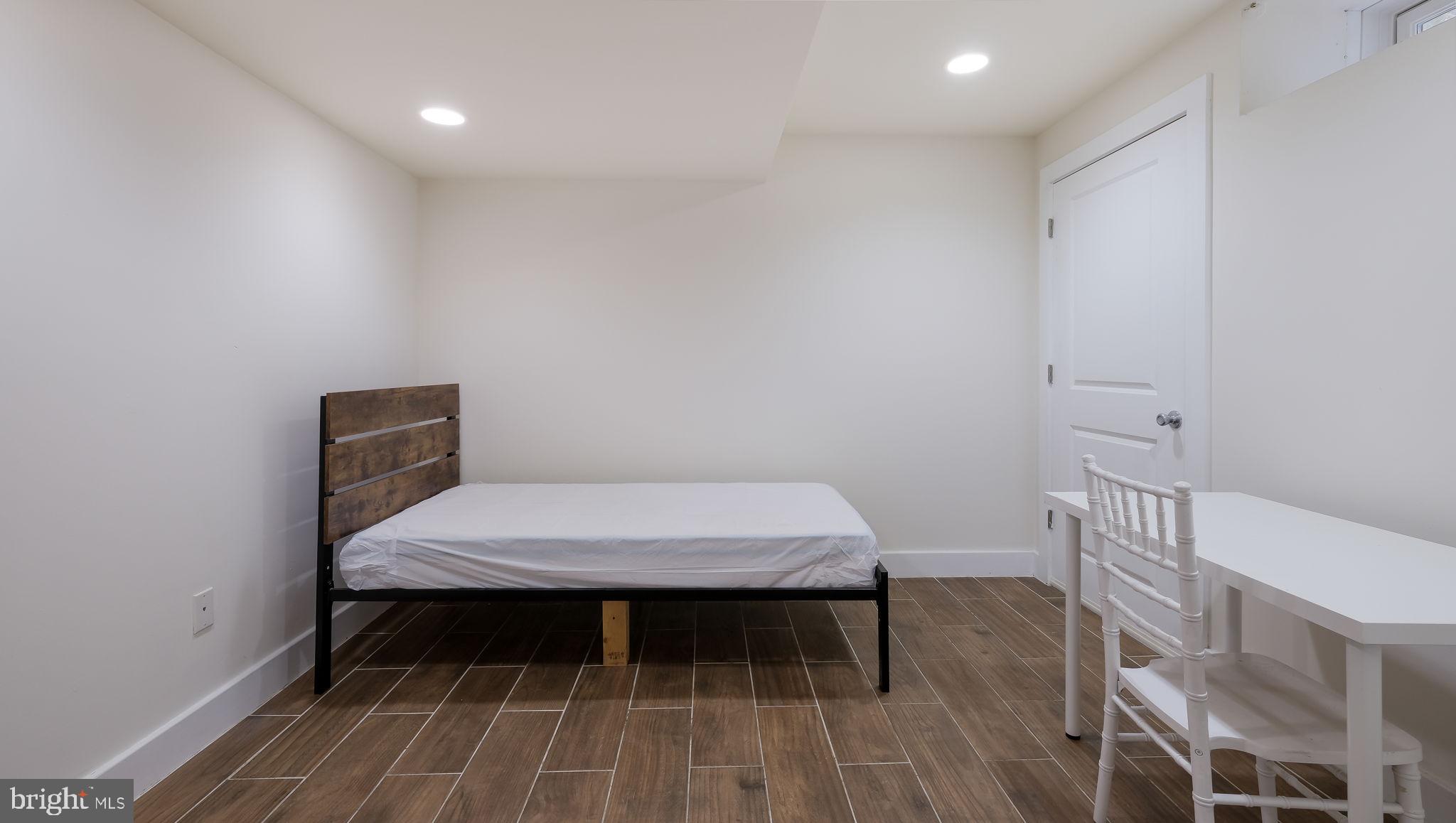 436 Sloan Street Philadelphia, PA 19104 - Photo 19 of 21 a room with a table and chairs