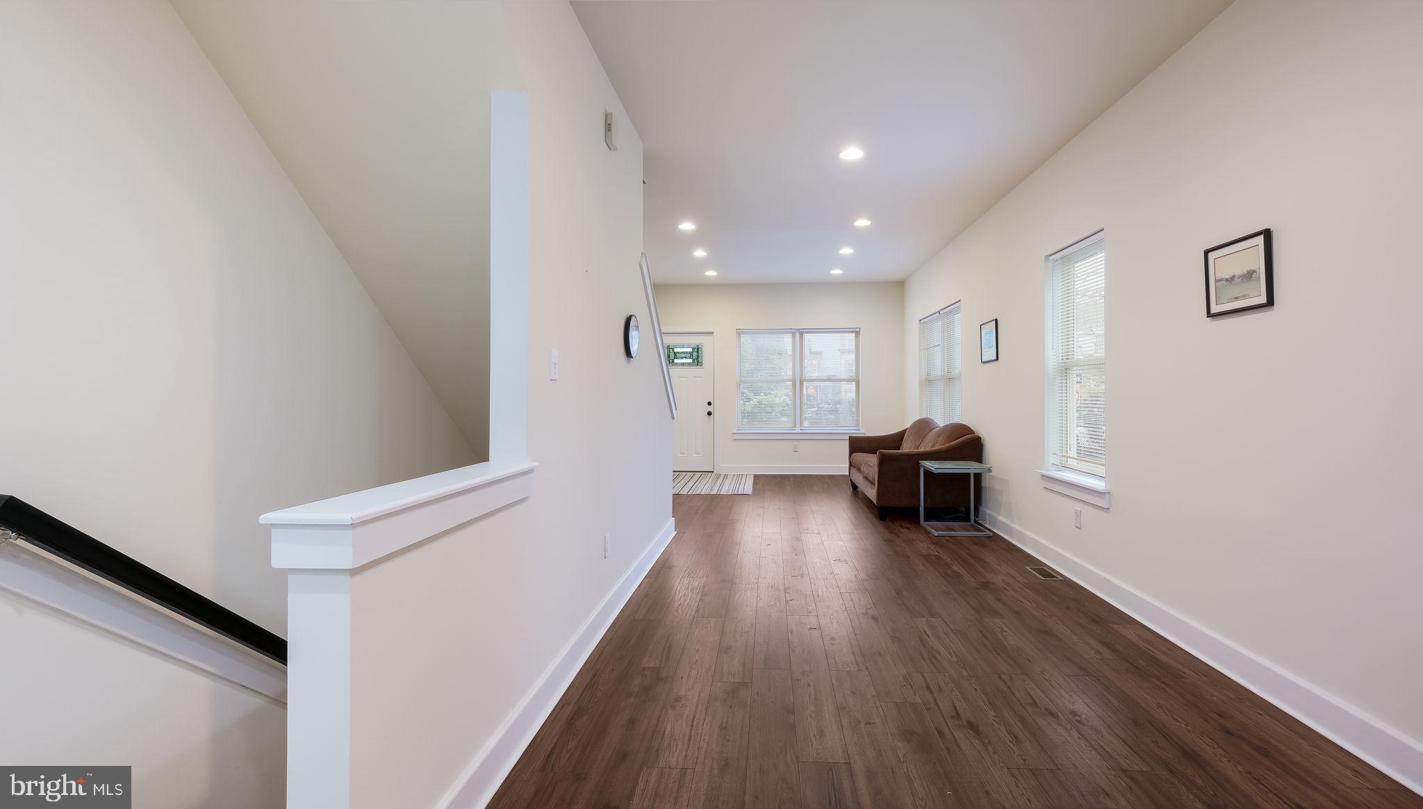 436 Sloan Street Philadelphia, PA 19104 - Photo 5 of 21 a living room with furniture and a wooden floor