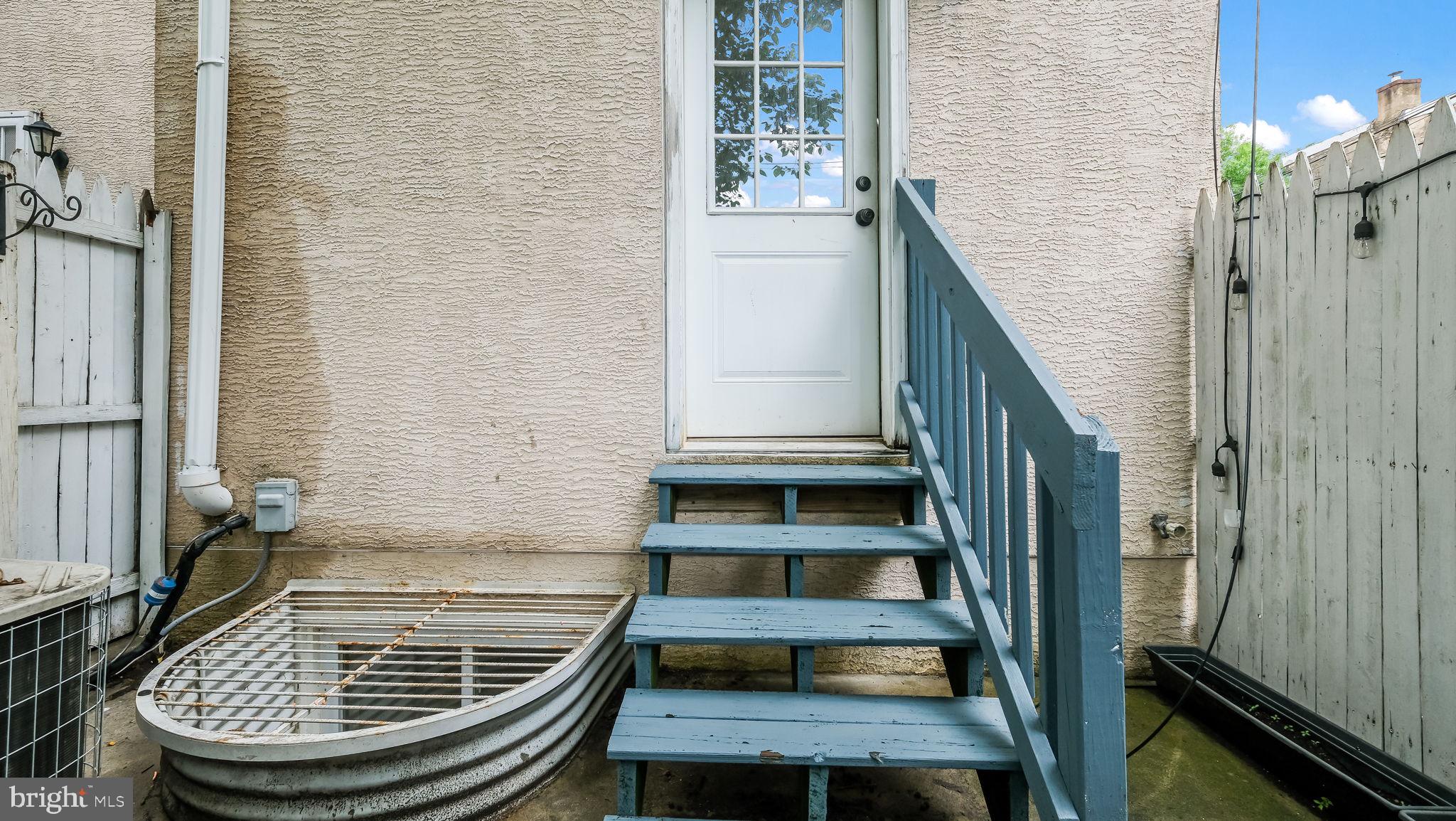 436 Sloan Street Philadelphia, PA 19104 - Photo 9 of 21 a view of staircase with white walls and stairs