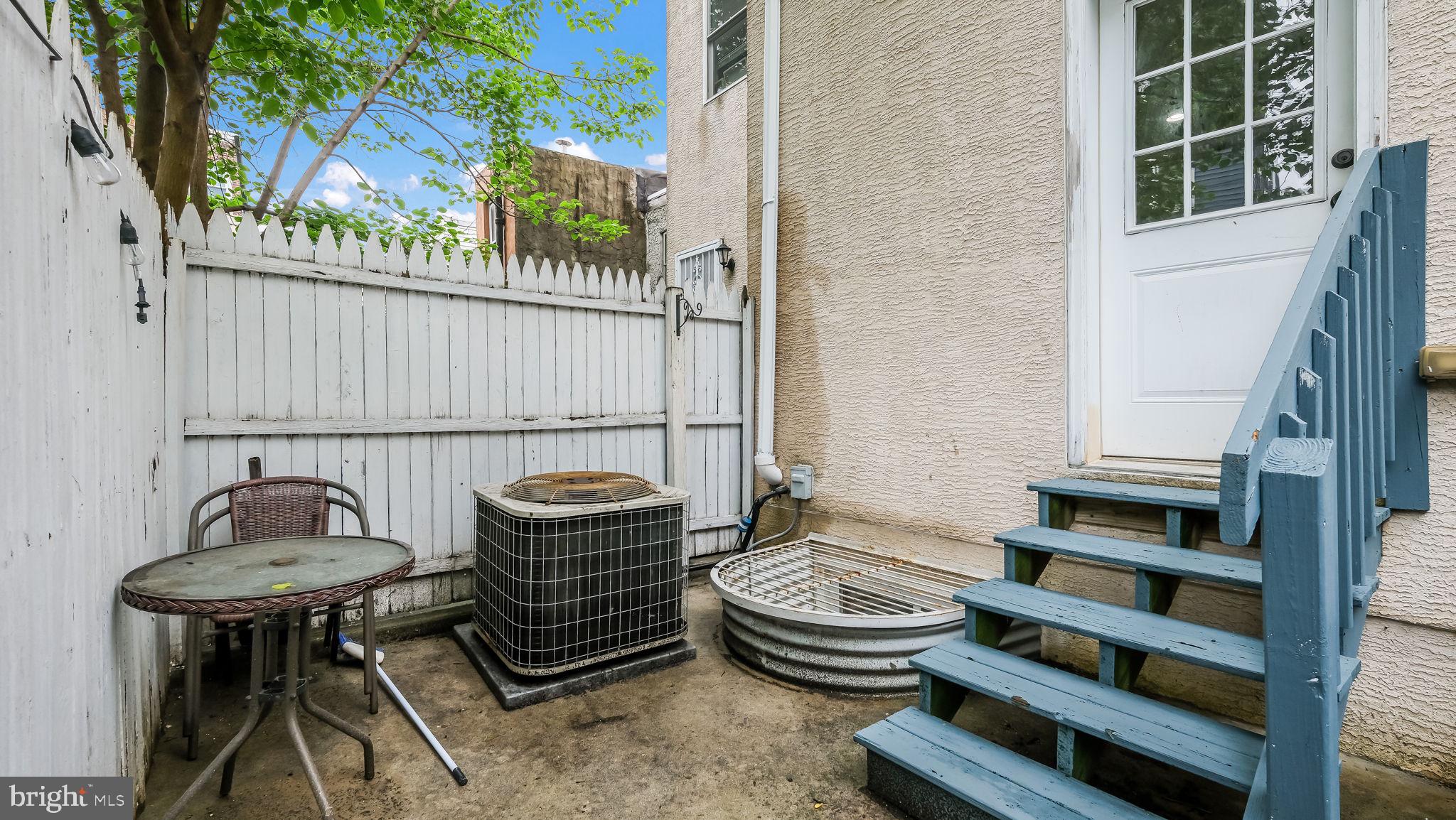 436 Sloan Street Philadelphia, PA 19104 - Photo 10 of 21 a bathroom with a sink a toilet and potted plant