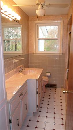7 Patricia Road Billerica, MA 01821 - Photo 11 of 18 a bathroom with a sink toilet and window