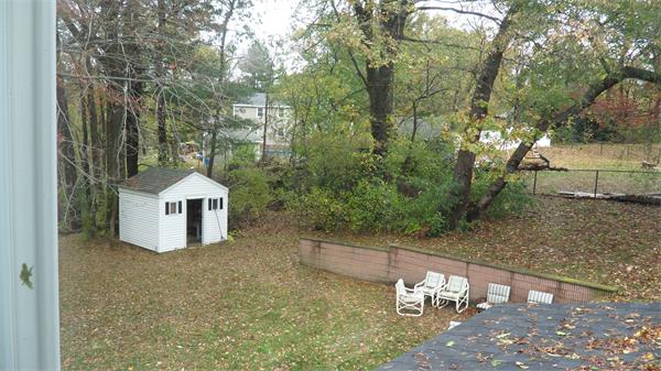 7 Patricia Road Billerica, MA 01821 - Photo 17 of 18 a view of a house with a yard