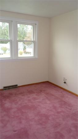 7 Patricia Road Billerica, MA 01821 - Photo 10 of 18 an empty room with a window
