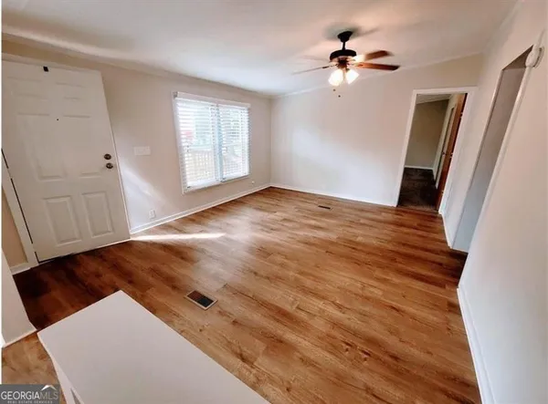 a room with closet and a fireplace