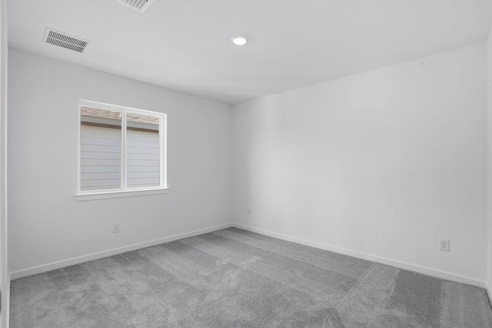 22122 Rangemore Drive Cypress, TX 77433 - Photo 11 of 28 an empty room with a window