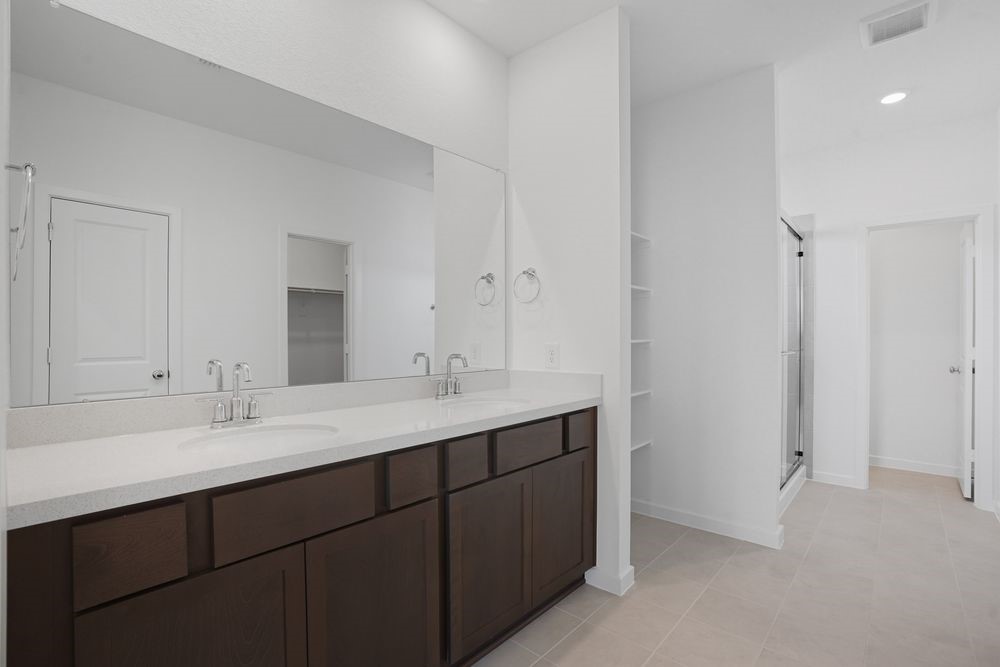 22122 Rangemore Drive Cypress, TX 77433 - Photo 8 of 28 a bathroom with a sink and a mirror