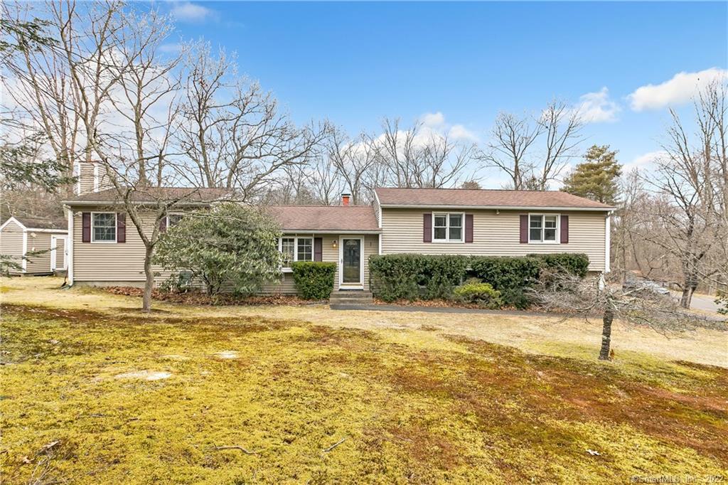 3 Chalk Hill Road Monroe, CT 06468 - Photo 1 of 1 a front view of a house with a yard