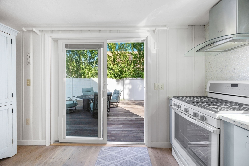 23 Zylpha Road Harwich, MA 02646 - Photo 13 of 39 a kitchen with a stove and a refrigerator