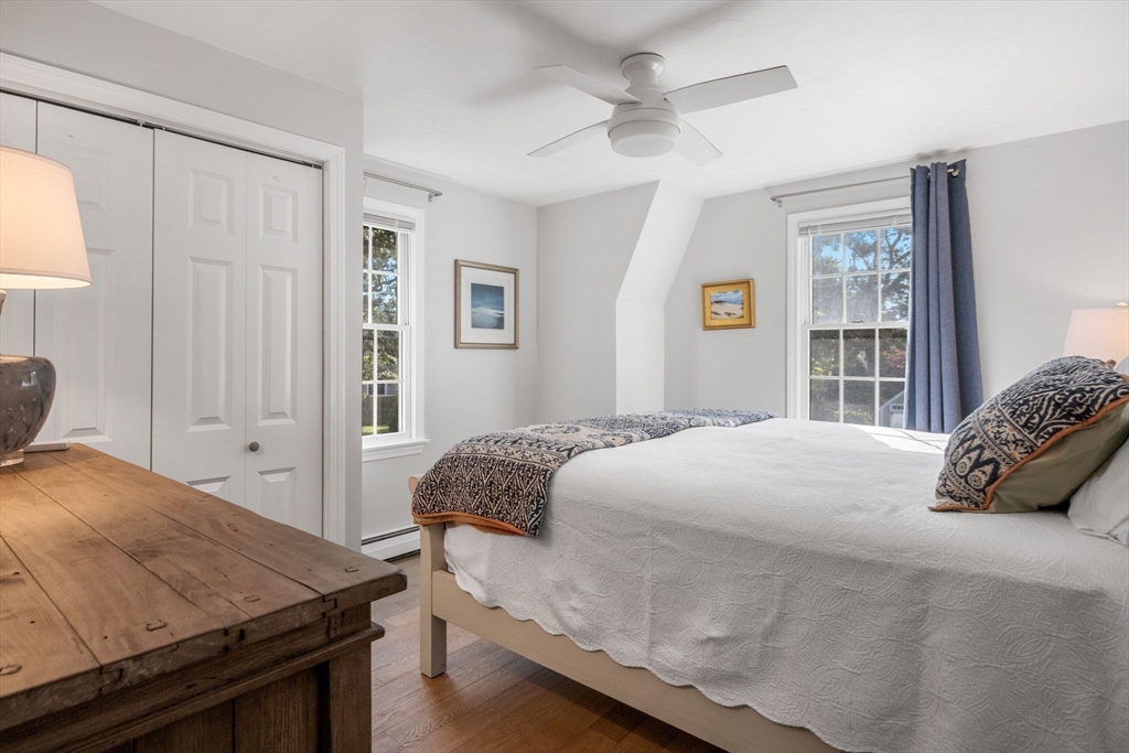 23 Zylpha Road Harwich, MA 02646 - Photo 20 of 39 a bedroom with a bed and a dresser