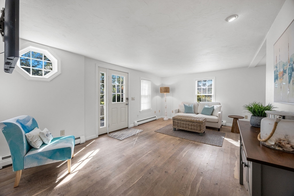 23 Zylpha Road Harwich, MA 02646 - Photo 6 of 39 a living room with furniture and wooden floor