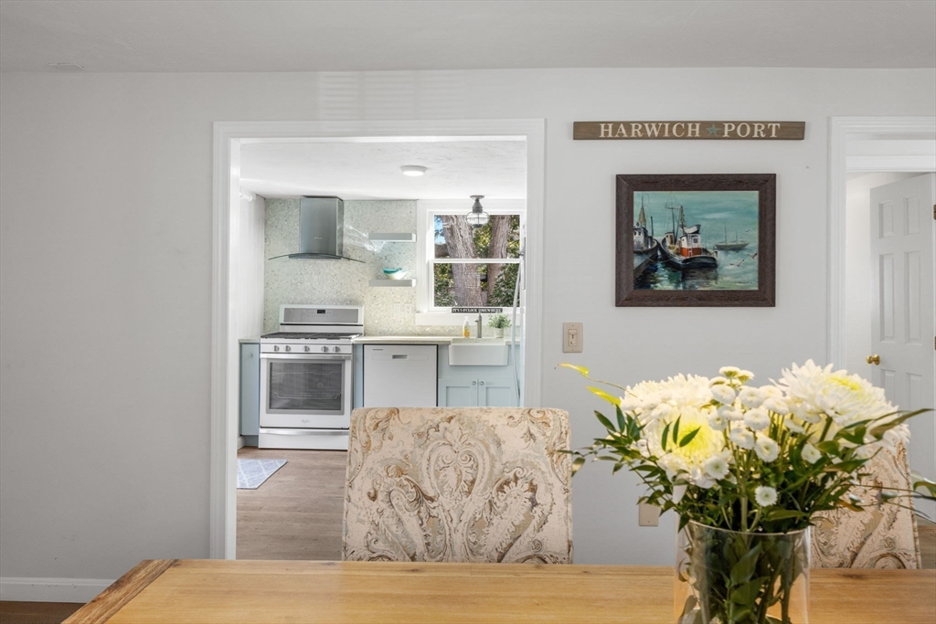 23 Zylpha Road Harwich, MA 02646 - Photo 9 of 39 a vase of flowers sitting on a table