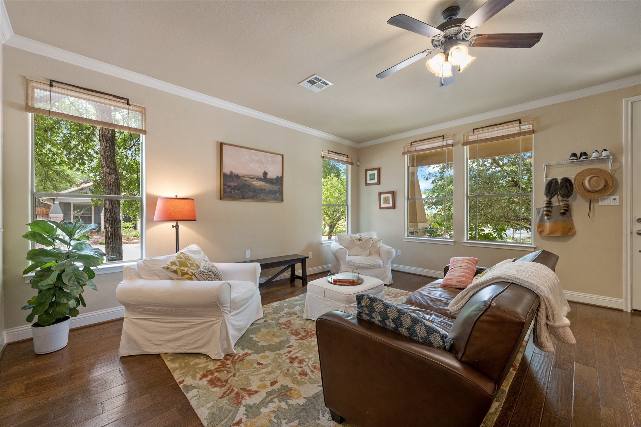 6025 Rutledge Lane Austin, TX 78745 - Photo 1 of 1 a living room with furniture and a large window