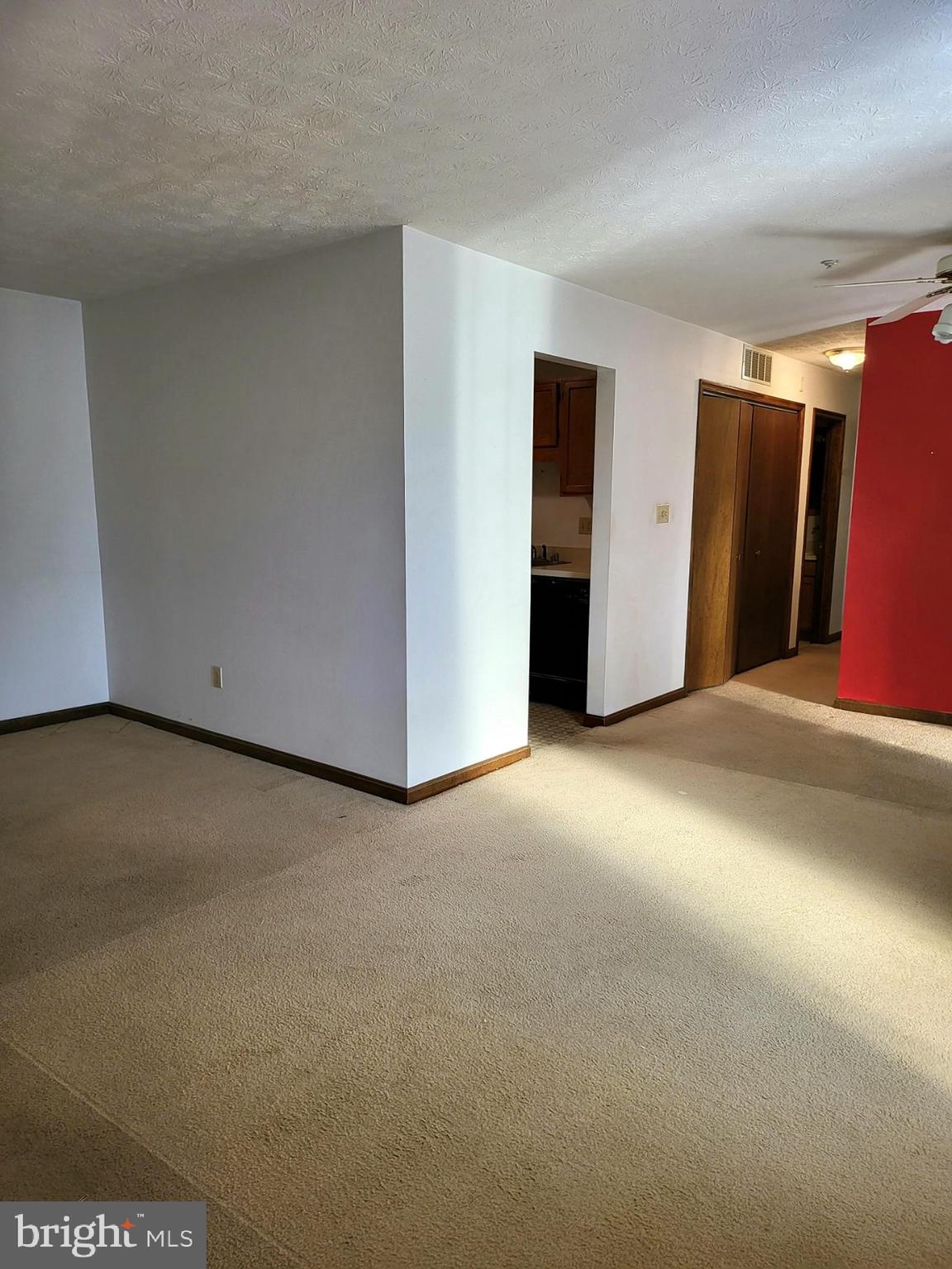 44788 Locust Ridge Court, Unit 8A California, MD 20619 - Photo 6 of 24 living room to kitchen