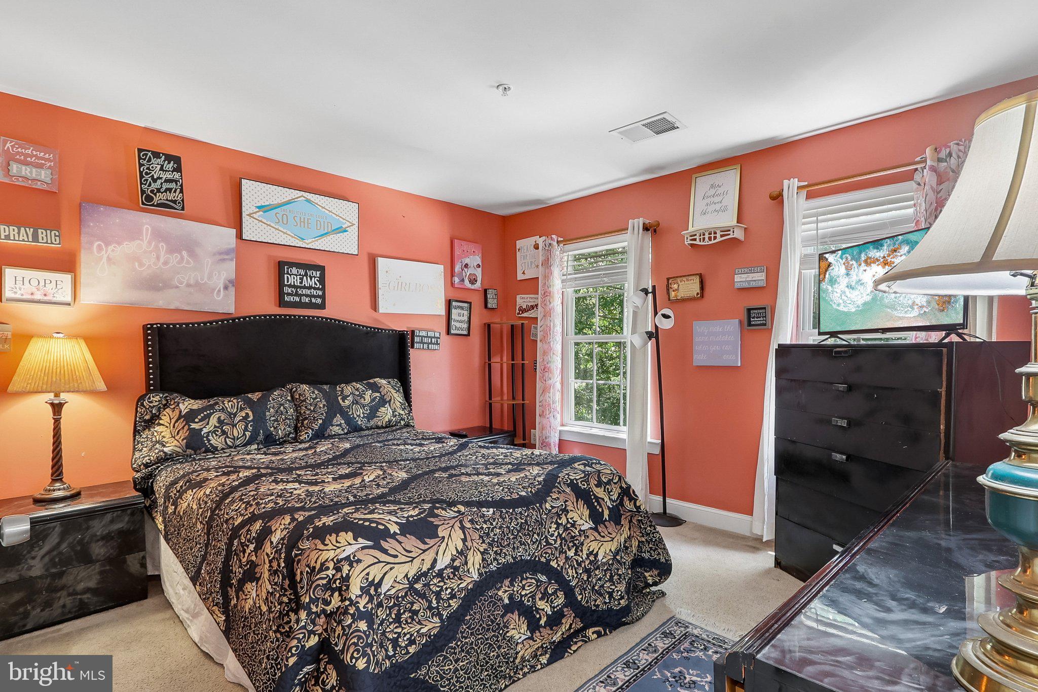 9003 Eldon Drive Clinton, MD 20735 - Photo 29 of 54 Vibrant bedroom with artistic flair.