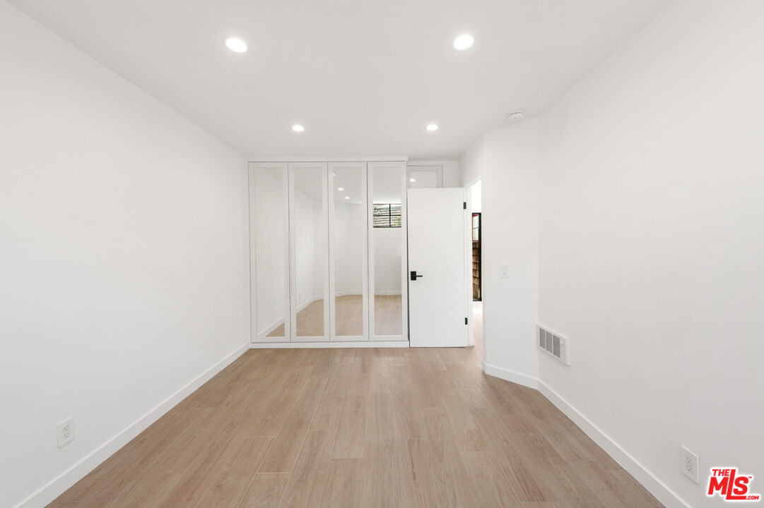29233 Heathercliff Road, Unit 4 Malibu, CA 90265 - Photo 12 of 20 a view of wooden floor in an empty room