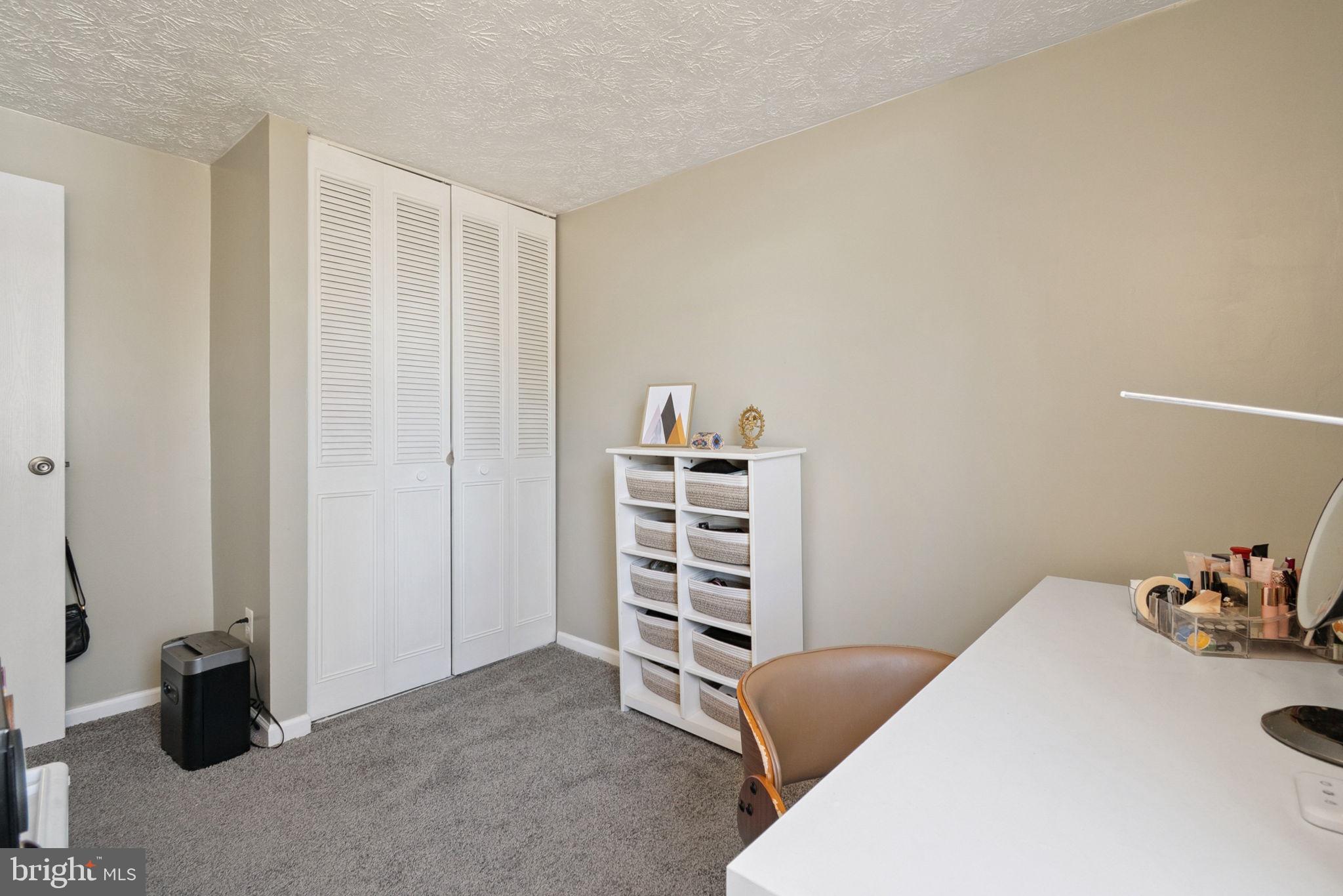 15057 Mill Spring Drive Dumfries, VA 22025 - Photo 15 of 21 a living room with furniture and a window